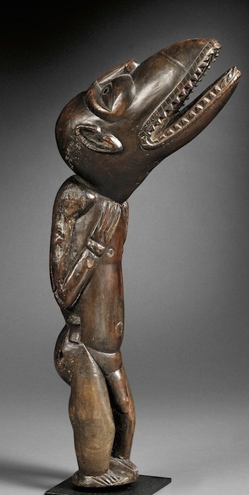 Easter island wood sculpture lizard man