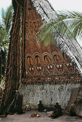 Native Fijian warrior with war clubs